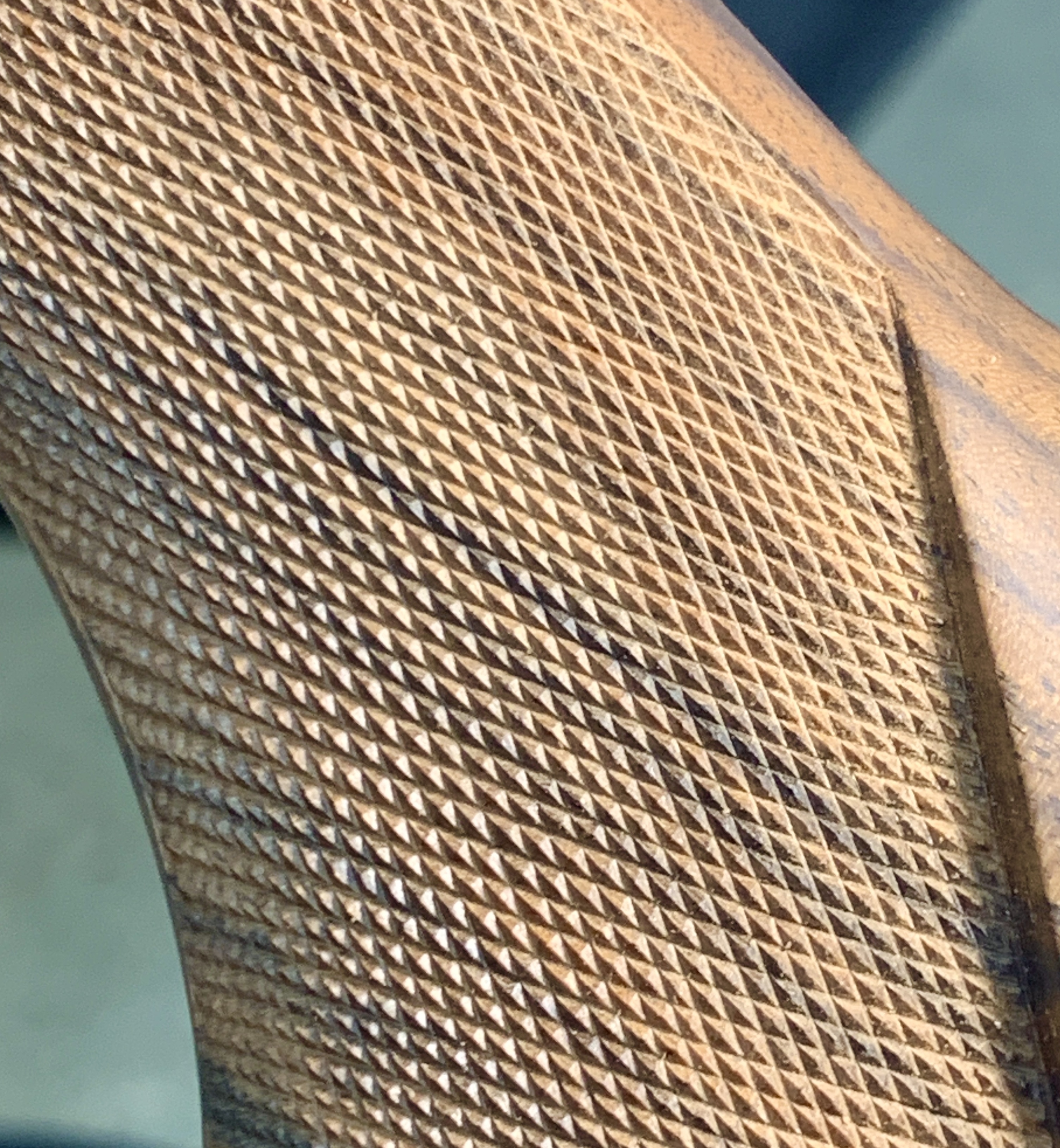 A close-up of a 2.5:1 checkering pattern.